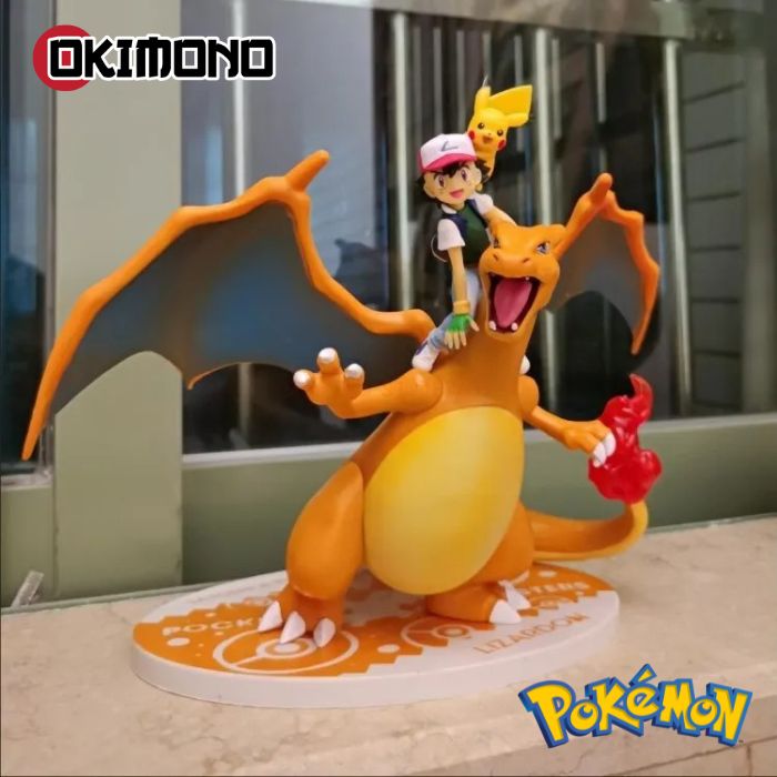 Figurine Sacha, Dracaufeu et Pikachu - Pokémon™